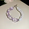 Close-up of asymmetric purple acrylic faceted beads and white pearl bracelet - 56# Bracelet / White-Purple