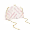 Detail of semicircular acrylic clutch with pink marble texture and gold chain strap - White