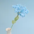 Handmade light blue crochet lily flower in a white ceramic vase with green leaves - Blue