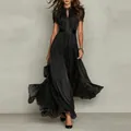 Detail of black V-neck maxi dress with lace embroidery and flowing pleated skirt - S / Top And Bottom / Black