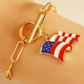 Gold chain bracelet with toggle clasp and American flag heart pendant on wrist - Gold Waving Flag OT Buckle Bracelet (N-910)