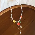 Close-up of crystal stone beaded necklace with resin flower pendants in summer style. - Multicolor (19#)