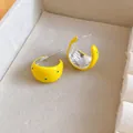 C-shaped hoop earrings with yellow enamel finish and blue polka dots design - Silver Earring Post - Yellow