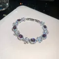 Elegant vintage silver-tone bracelet featuring purple zircons and floral zircon clusters - 21# Bracelet / Silver Purple