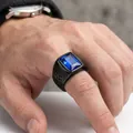 Close-up of vintage black signet ring for men with a large rectangular blue gemstone - Black Dark Blue Zirconia