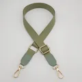 Detail of sage green adjustable cotton strap with gold metal hooks for crossbody bags - Matcha Green