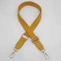Detail of adjustable yellow canvas bag strap with golden metal swivel lobster clasps - Yellow