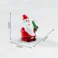 Miniature Santa Claus resin figurine holding a green tree, 3.5cm height ornament - Long-bearded Santa Claus