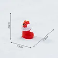 Miniature resin red Christmas stocking figurine with gift box topper and size details - Socks