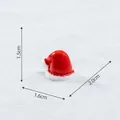 Miniature resin Santa hat figurine for Christmas decoration, measuring 1.5cm high - Small Christmas Hat
