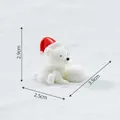 Miniature polar bear figurine with a red Christmas hat for micro landscape decor - Bear Playing with Snowball