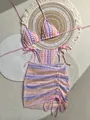 Detailed macro view of bohemian three-piece crochet bikini with colorful wave patterns - S / Top And Bottom / Light Pink