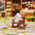 Cute white cat figurine fishing on a wooden rocking chair for desktop decoration - Fishing Cat Figure (1256-3)