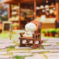 Cute white puppy miniature figurine sitting in a wooden rocking chair holding a fishing rod - Fishing Dog Figure (1256-3)