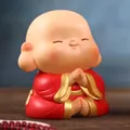 Cute monk figurine in red robe praying peacefully on a desktop with zen beads decoration - Zen Monk Free Style (1234-2 Large)