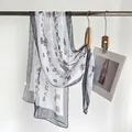 Long summer chiffon scarf with black calligraphy print on white background and red seal details - Ink Wash White