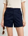 Detail of navy blue cargo shorts with side pockets and elastic waist on female model - Navy Blue