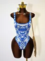 Sleek one-piece swimsuit with blue floral print on white base and high-cut leg - S / Blue Baroque Print