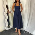 Elegant navy blue halter neck maxi dress with high waist and flowy linen-like texture - S / Navy Blue