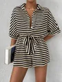 Detail of striped short romper with button closure and matching waist belt for summer wear - Black Apricot