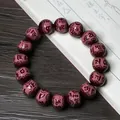 Dark red carbonized Bodhi root beaded bracelet with engraved mantra symbols for meditation - Cherry Red Carved Six Characters