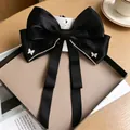 Elegant black satin bow hair clip with rhinestone butterfly and long flowing tassels - Chain Rhinestone Bow / Black