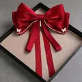 Elegant red satin bow hair clip with sparkling rhinestones and long flowing ribbons - Chain Rhinestone Bow / Burgundy