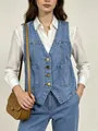 Gilet in denim senza maniche azzurro con bottoni dorati e jeans a vita alta abbinati - M / Azzurro