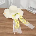 Cream wide brim straw sun hat featuring yellow tulips and delicate mesh bow detail - Decorative Wind Chimes White And Yellow