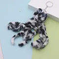 Cute plush octopus keychain with black and white spotted faux fur and blue eyes - 18cm / White Leopard Print