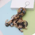 Plush octopus keychain with brown spotted fur and large eyes on a blue display stand - 18cm / Coffee Leopard