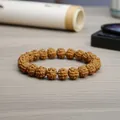 Natural Rudraksha bead bracelet in deep brown with textured finish for men and women - Toad Back 8-12mm [single Ring]