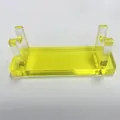 Macro detail of translucent yellow acrylic pen display stand with double U-shaped supports - Yellow