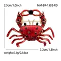 Macro view of red crab brooch showing dimensions 2.5cm height and 3.2cm width - Red