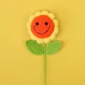 Handmade crochet sunflower with smiling face pattern and bright yellow petals - Orange-smiley Sunflower Branches