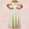 Detailed view of the square neckline and puffed short sleeves on this floral summer dress - 3XL / Goose Yellow Floral