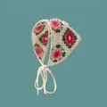 Detailed close-up of handmade white crochet floral triangle headscarf with pink flowers - Tulip Apricot