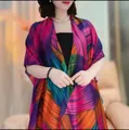 Detailed view of colorful satin sun protection shawl with elegant floral prints - High Saturation Art Color Blocks (Color 15)