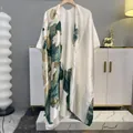 Elegant cream satin sun-protection shawl with green lotus prints and wide sleeves - Oriental Lotus Vine (Split)