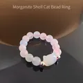 Dettaglio ravvicinato di perle di morganite e gatto in conchiglia su anello moda - Morganite (Gatto Conchiglia)
