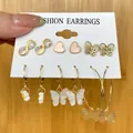 Set van 6 paar gouden mode-oorbellen met vlinders, parels en roze hartjesstekers - Vlinder En Roze Hart (WH0015-1)