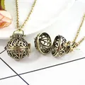 Collana con medaglione in bronzo vintage con motivo filigranato e sfera apribile - Ciondolo Fiori di Primavera Bronzo Antico