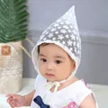 Detailed view of white floral lace baby bonnet with delicate embroidery and ties - Plum Blossom Pixie Hat