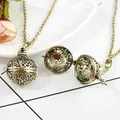 Collana medaglione vintage in bronzo con motivi floreali e perla rossa all'interno - Ciondolo Rosa in Fiore Bronzo Antico