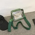 Transparent PVC green crossbody bag with a wide canvas strap and beige inner pouch - Green