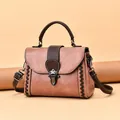 Vintage bean paste brown leather crossbody bag with contrasting dark brown woven trim - Dusty Pink