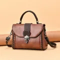 Vintage caramel brown satchel with woven details and metallic buckle for women - Caramel color