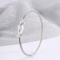 Bracelet câble en acier inoxydable argenté avec un fermoir manille élégant - Argenté
