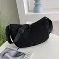 Minimalist black corduroy crescent crossbody bag with adjustable wide fabric strap - Black