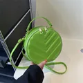 Borsa a tracolla rotonda trapuntata verde brillante con cerniera in metallo dorato - Verde